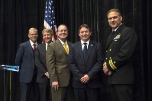 Pictured left to right are Dr. William Burnett, Deputy Commander and Technical Director to the Naval Meteorology and Oceanography Command; John Wilson, Executive Director, INFINITY Science Center; Dr. Richard Gilbrech, Director, NASA Stennis Space Center; Michael McDaniel, Chairman of Partners for Stennis of Aerojet Rocketdyne; and, Lt. Commander Kerry Jackson, Naval Small Craft Instruction and Technical Training School.